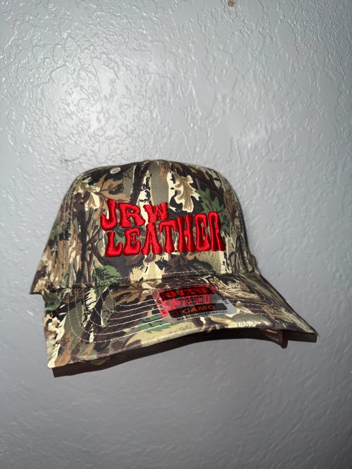 Red Puff Logo on Camo Trucker Hat